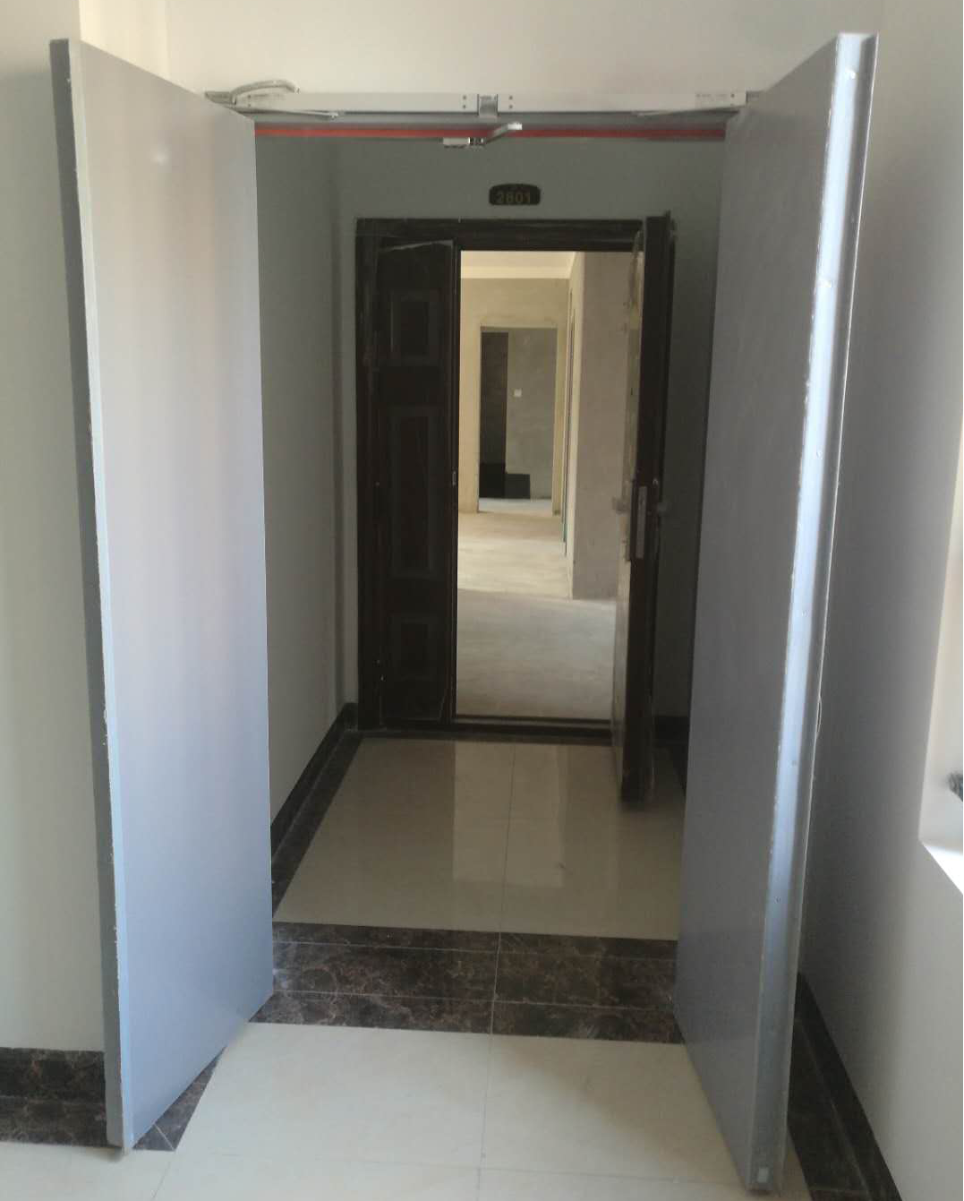 雙常開防火門電動(dòng)閉門器安裝現(xiàn)場圖